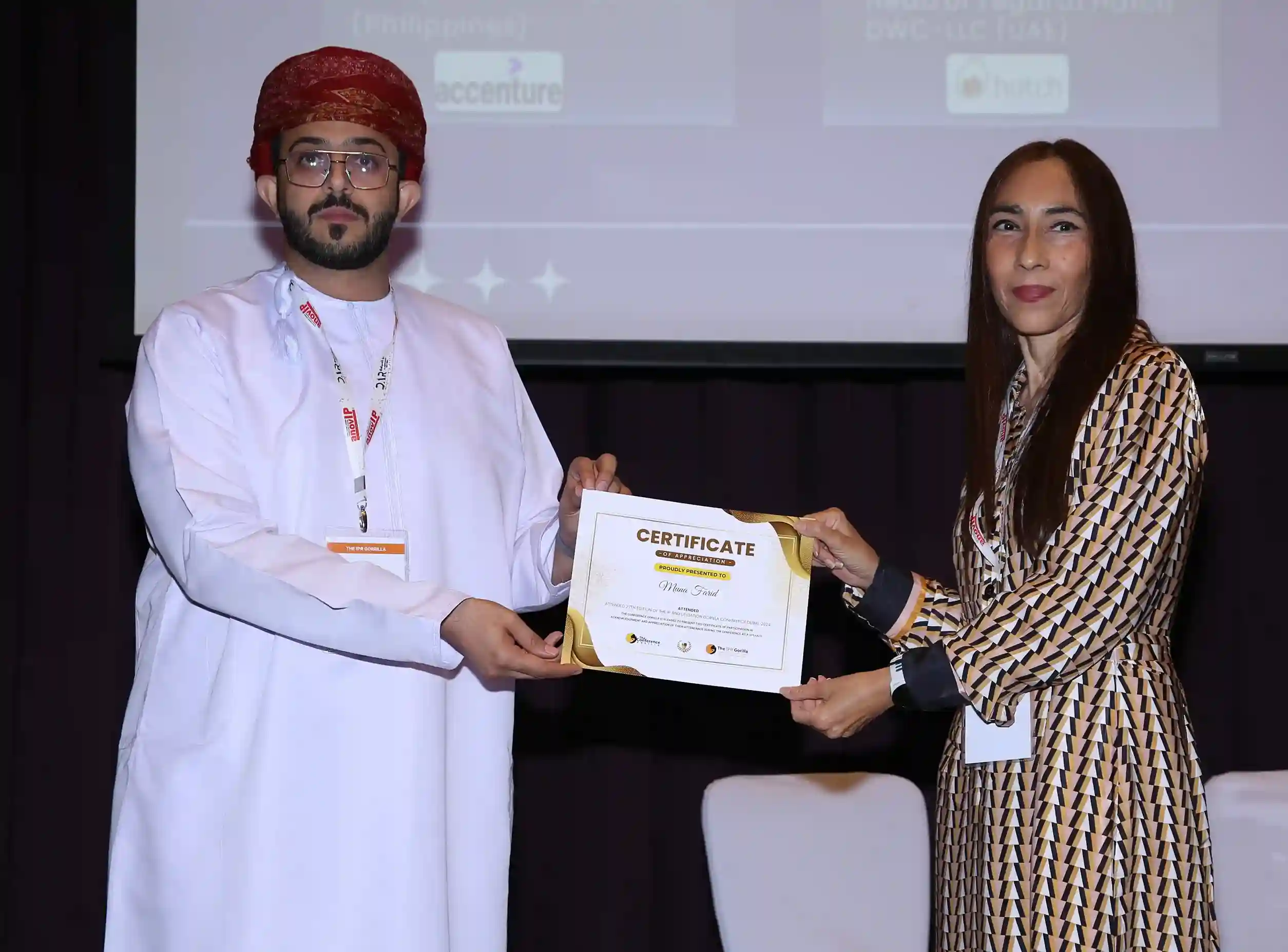 Conference Attendees taking notes